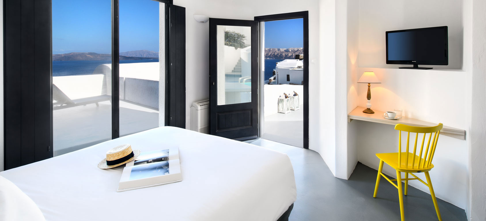 Grand Ambassador Santorini Hotel Luxury Suite bedroom